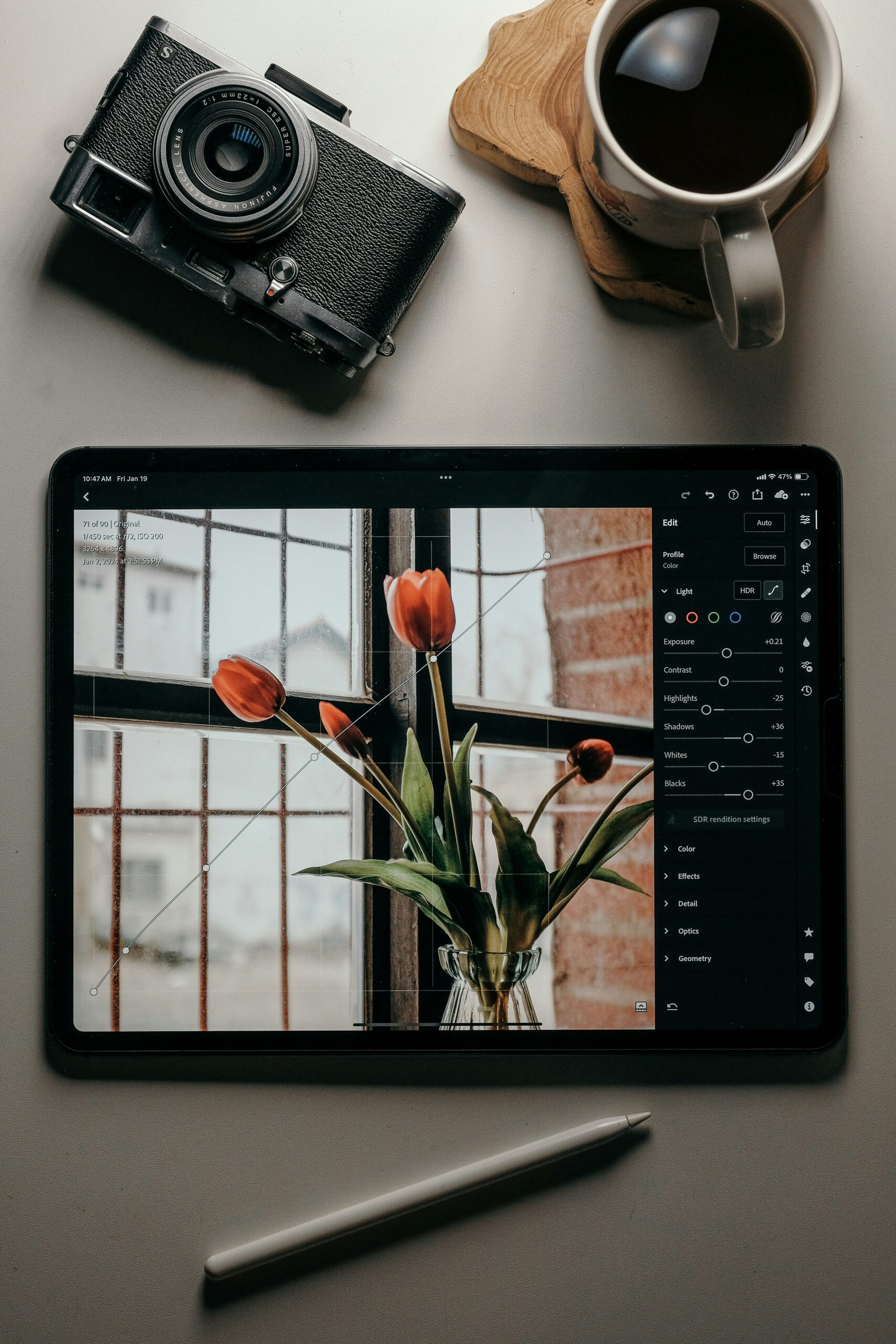   Photo by <a href="https://unsplash.com/@insungpandora?utm_content=creditCopyText&utm_medium=referral&utm_source=unsplash">insung yoon</a> on <a href="https://unsplash.com/photos/a-tablet-with-a-picture-of-tulips-and-a-camera-U3EJMiBn6w0?utm_content=creditCopyText&utm_medium=referral&utm_source=unsplash">Unsplash</a>
  